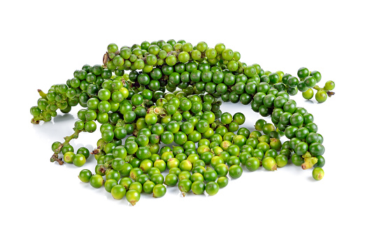 Whole fresh green pepper berries